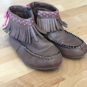 Brown and pink moccasin boots